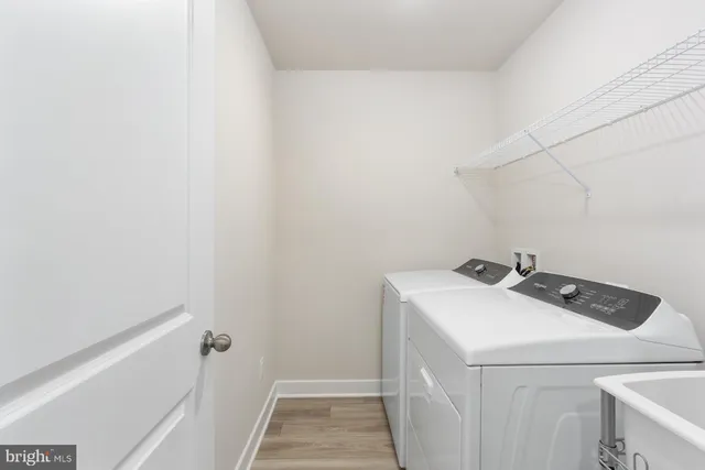 a view of a room with balcony and furniture