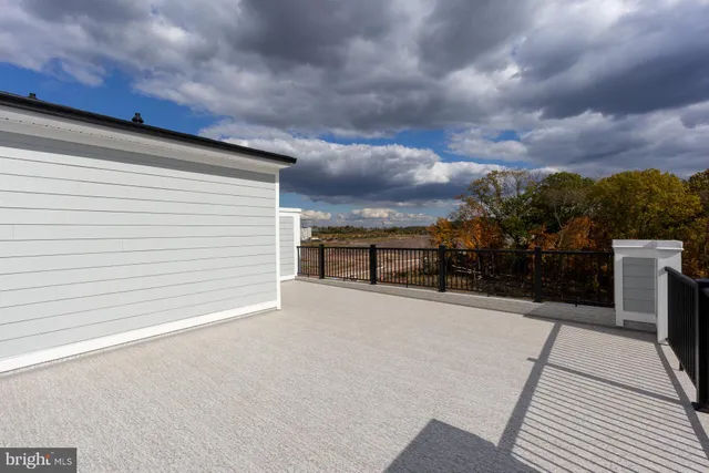 a front view of a building with street view