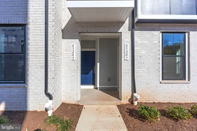 a stone house with a outdoor space
