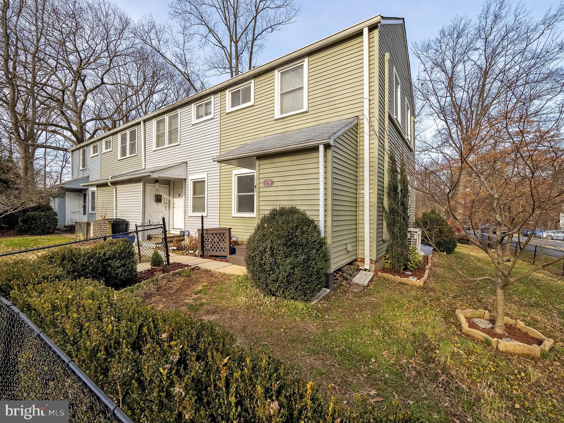 55 Ridge Road, Unit M Greenbelt, MD 20770 - Photo 2 of 32 This end unit has a small utility room addition.