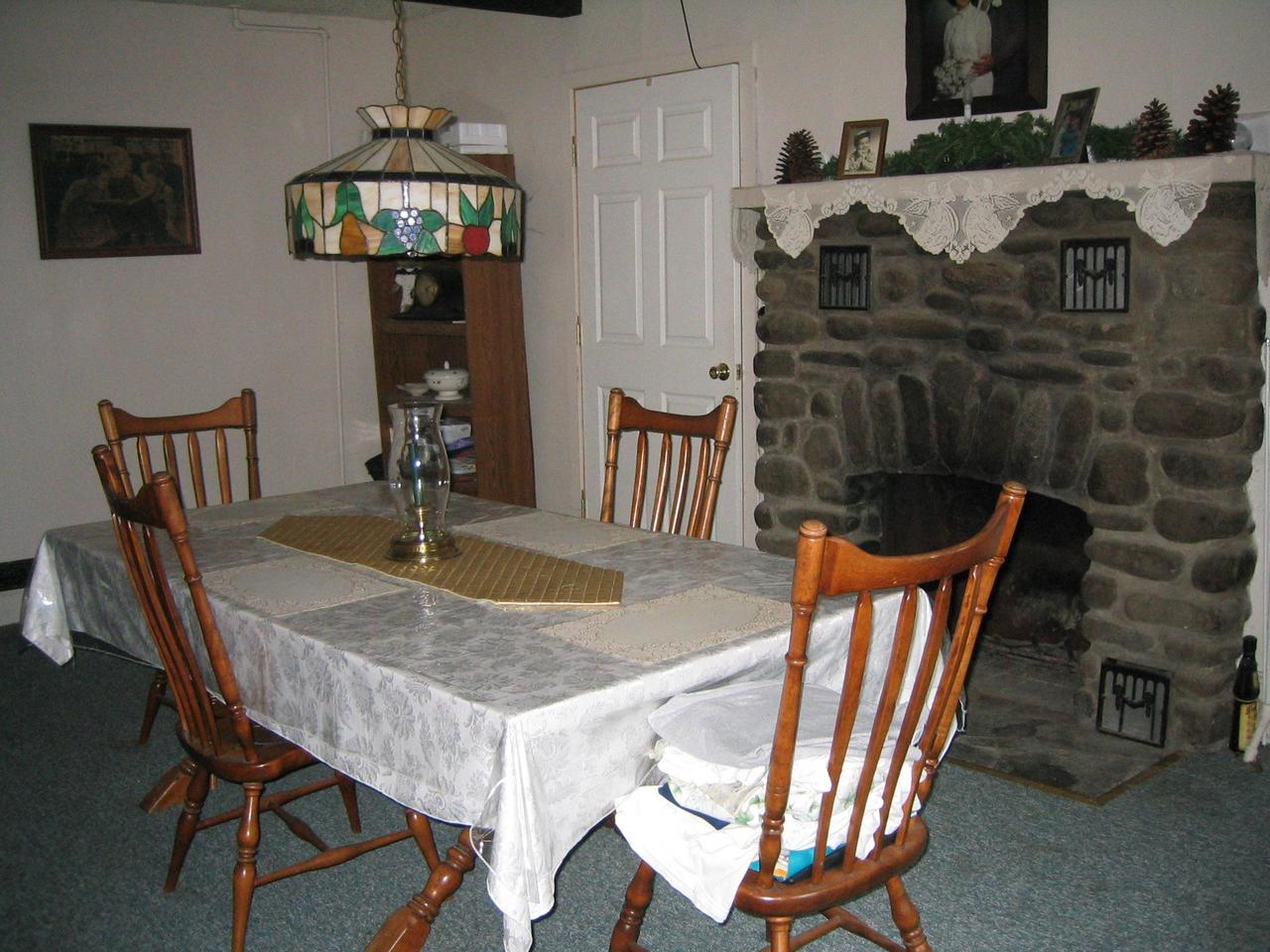 1692 Merry Hill Road Mount Pocono, PA 18344 - Photo 7 of 7 Dining room with fireplace