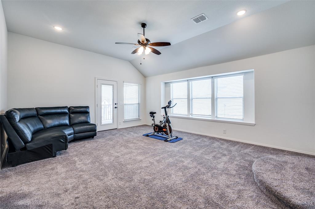 1616 George Lane Little Elm, TX 75068 - Photo 16 of 28 a living room with furniture and a window