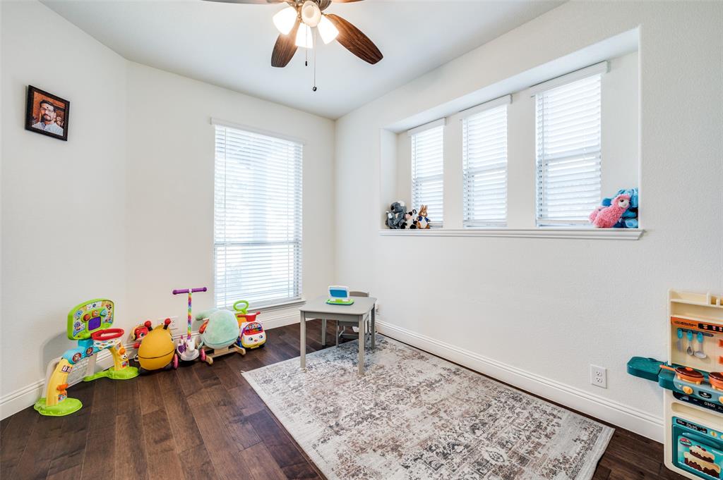 1616 George Lane Little Elm, TX 75068 - Photo 21 of 28 a view of a workspace with furniture and a window