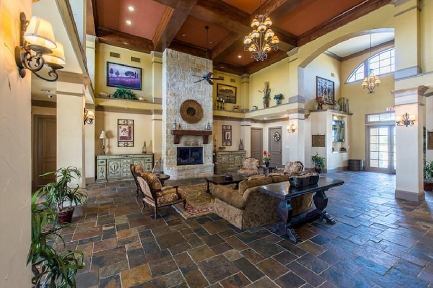 1616 George Lane Little Elm, TX 75068 - Photo 26 of 28 a living room with fireplace furniture and a large window