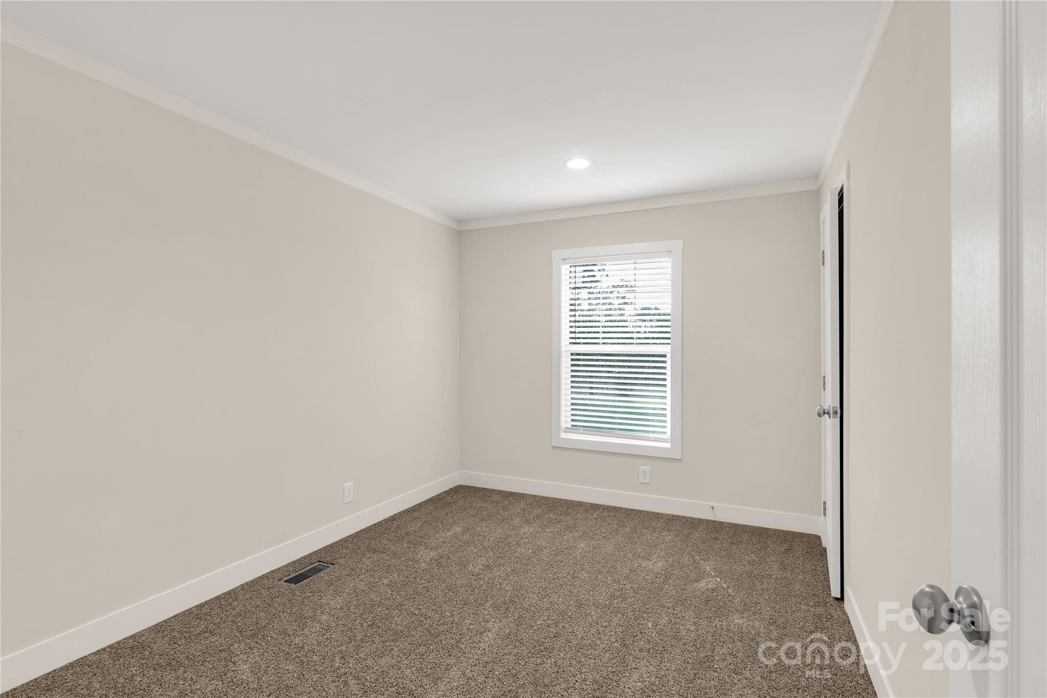 1100 Turkey Creek Ridge Road York, SC 29745 - Photo 16 of 28 an empty room with a window