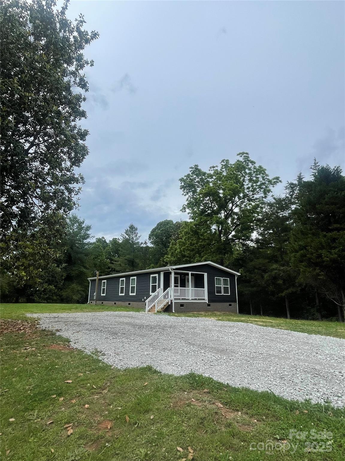 1100 Turkey Creek Ridge Road York, SC 29745 - Photo 26 of 28 a view of house with a yard