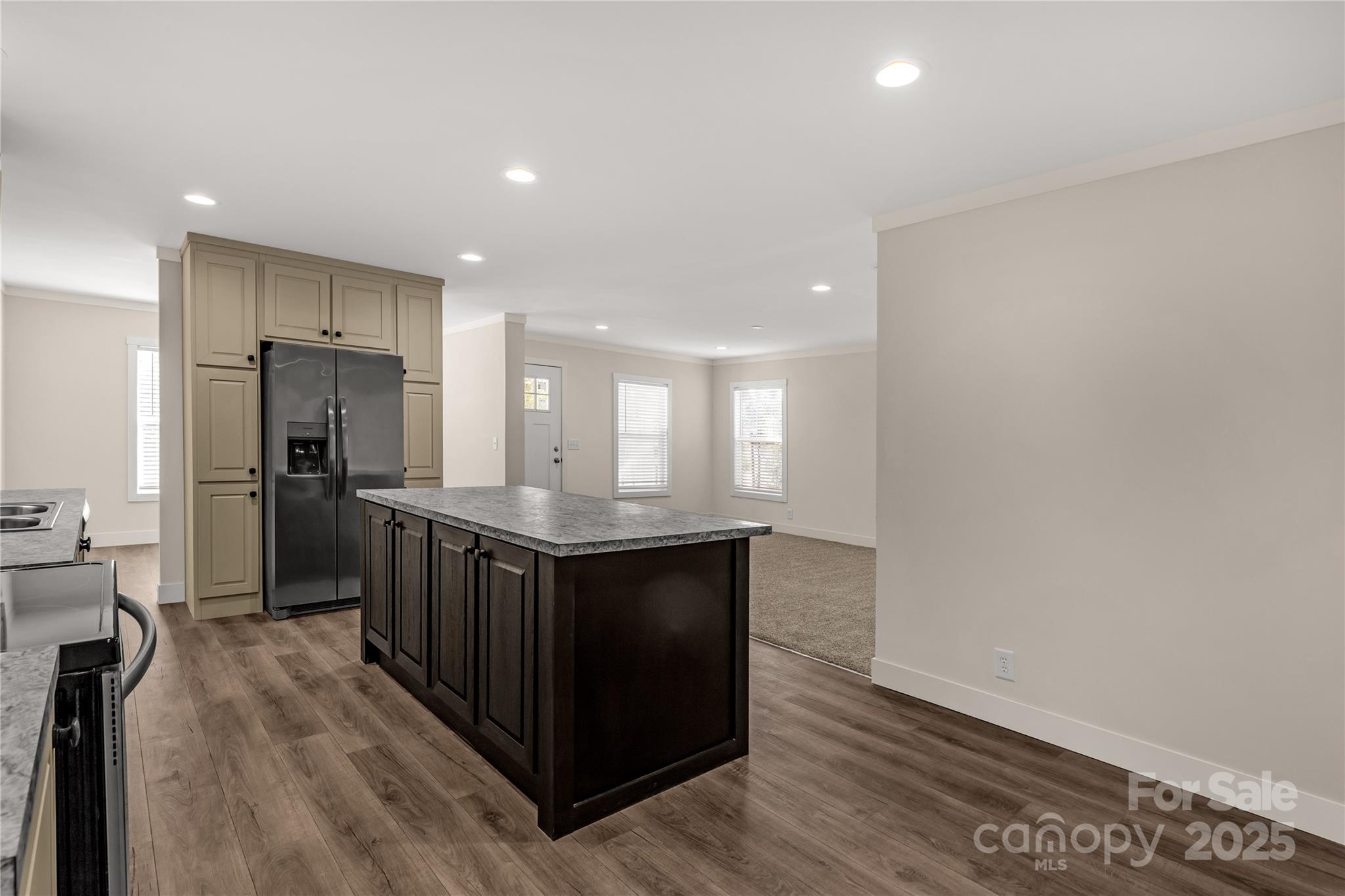 1100 Turkey Creek Ridge Road York, SC 29745 - Photo 5 of 28 a kitchen with stainless steel appliances granite countertop a stove and a refrigerator