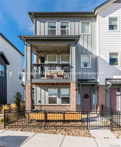 a front view of a house with glass windows
