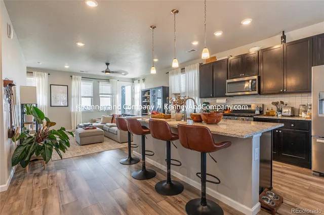 a kitchen with kitchen island granite countertop lots of counter top space