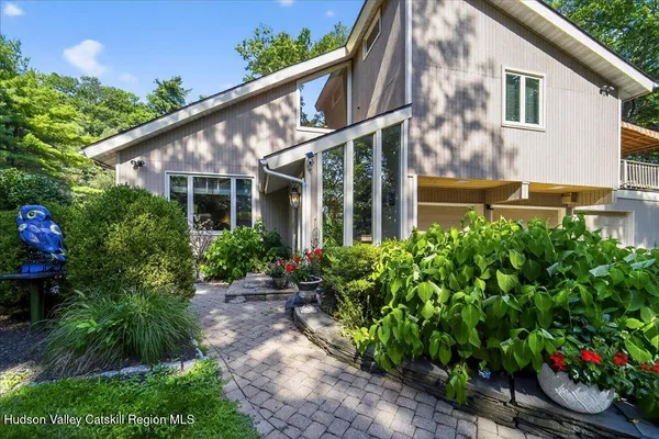 a backyard of a house with lots of green space