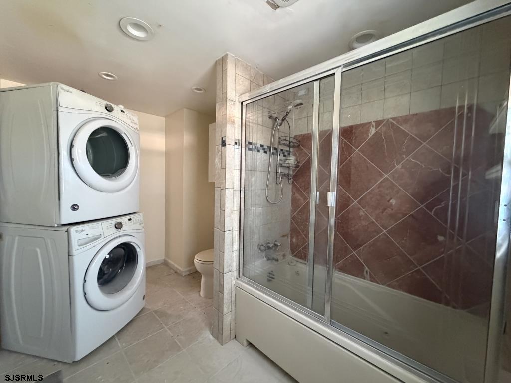 322 West Nicholson Road Mount Ephraim, NJ 08059 - Photo 23 of 47 a bathroom with a shower and a washing machine