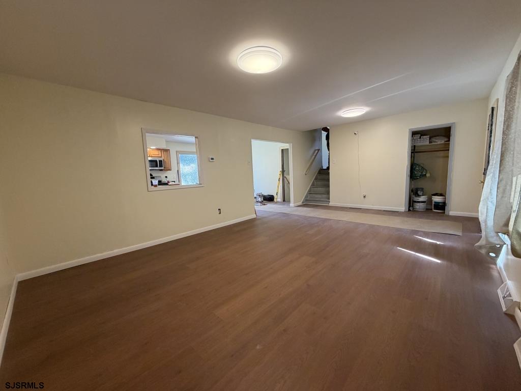322 West Nicholson Road Mount Ephraim, NJ 08059 - Photo 5 of 47 an empty room with windows and view of kitchen