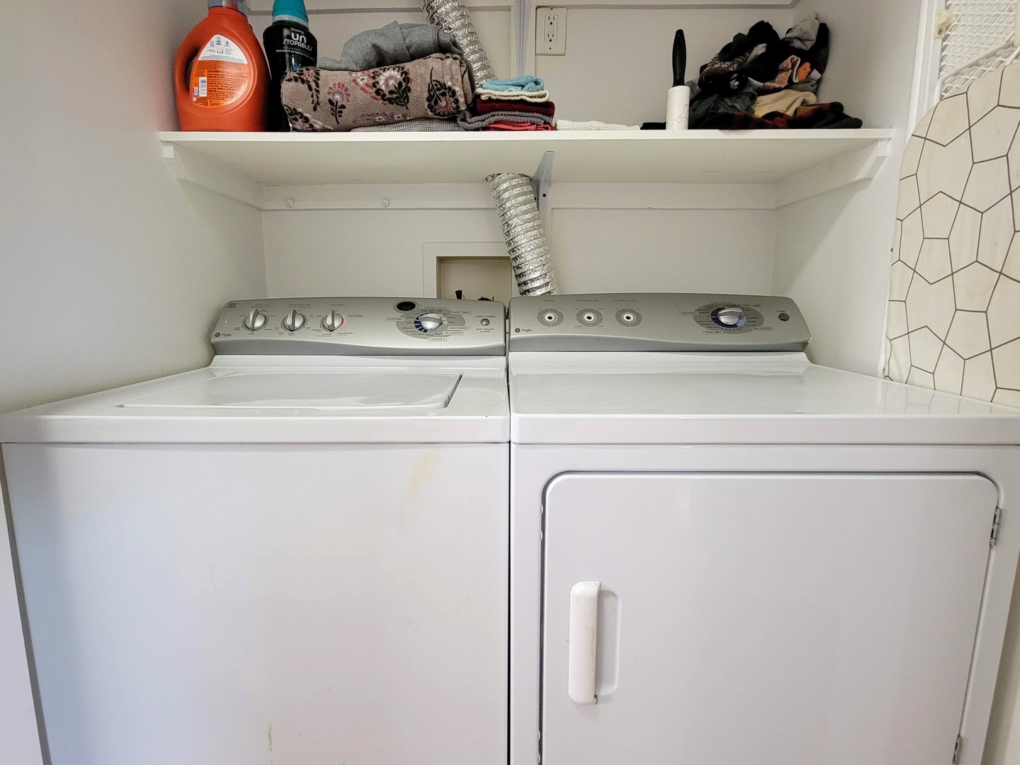 7538 North Ridge Boulevard, Unit 3E Chicago, IL 60645 - Photo 16 of 20 a utility room with dryer and washer