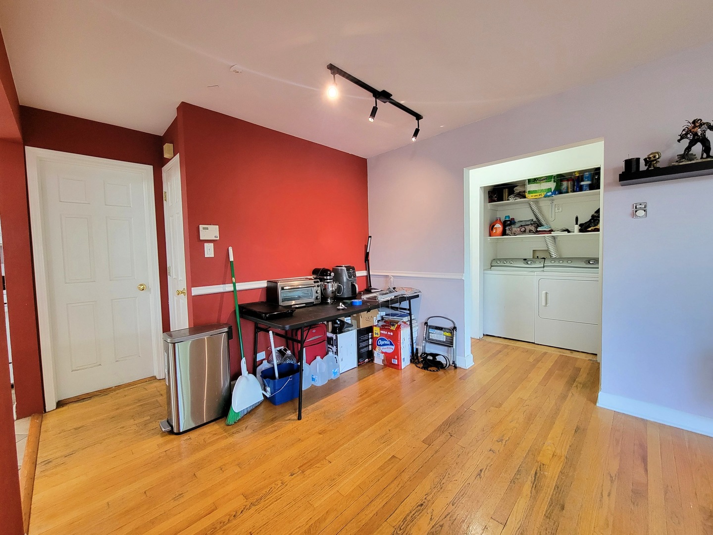 7538 North Ridge Boulevard, Unit 3E Chicago, IL 60645 - Photo 7 of 20 a view of a workspace with furniture and a kitchen