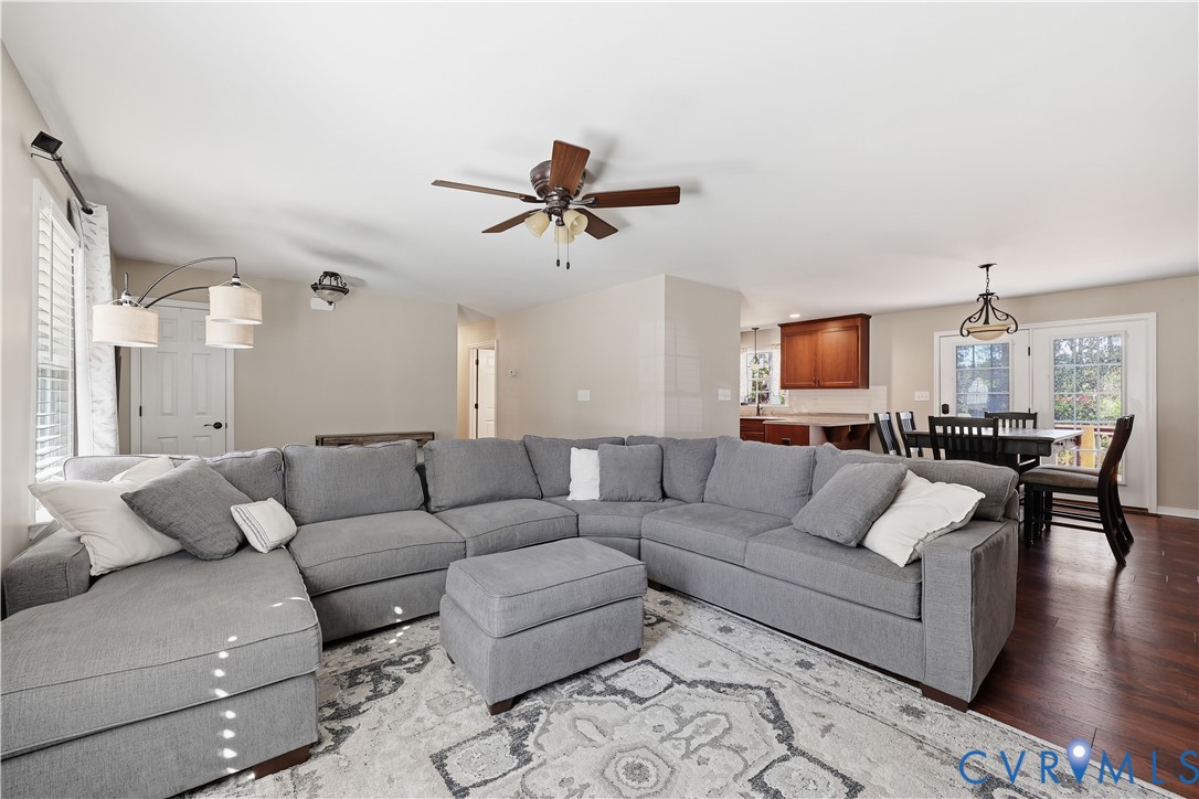28820 Butler Branch Road Petersburg, VA 23805 - Photo 10 of 27 a living room with furniture ceiling fan and a rug