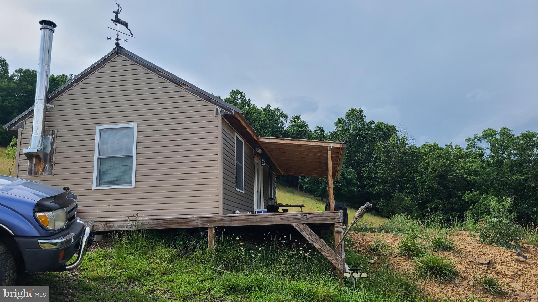 534 Co Rte 10/2 Franklin, WV 26807 - Photo 11 of 39 Charming hillside retreat with scenic views.