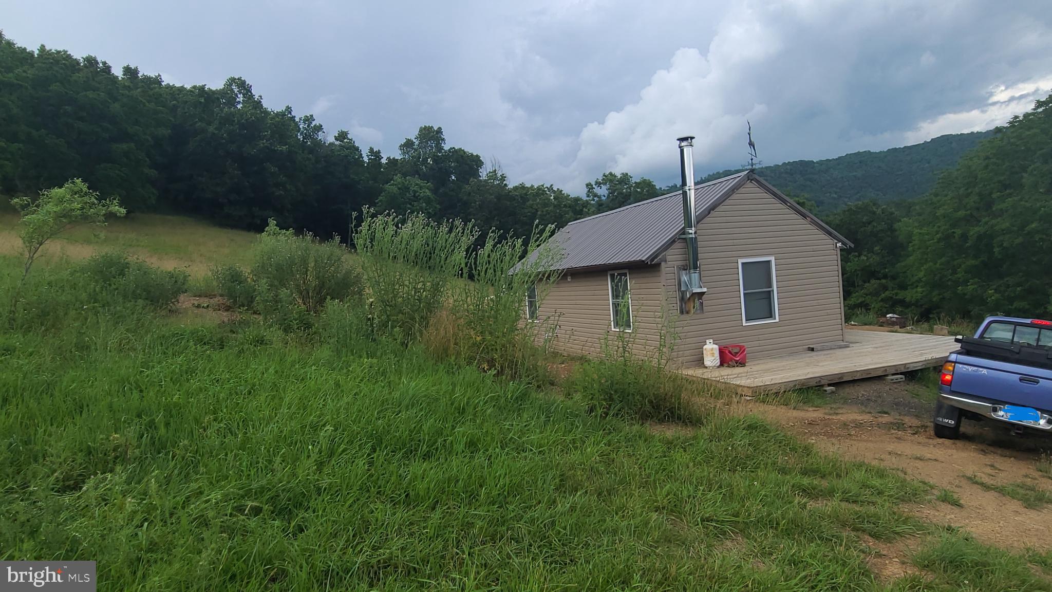 534 Co Rte 10/2 Franklin, WV 26807 - Photo 13 of 39 Charming retreat nestled in nature's embrace.
