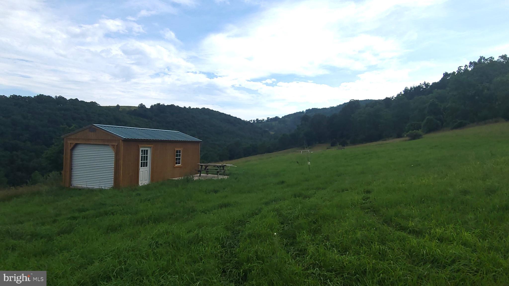 534 Co Rte 10/2 Franklin, WV 26807 - Photo 19 of 39 Charming shed amidst rolling green hills.
