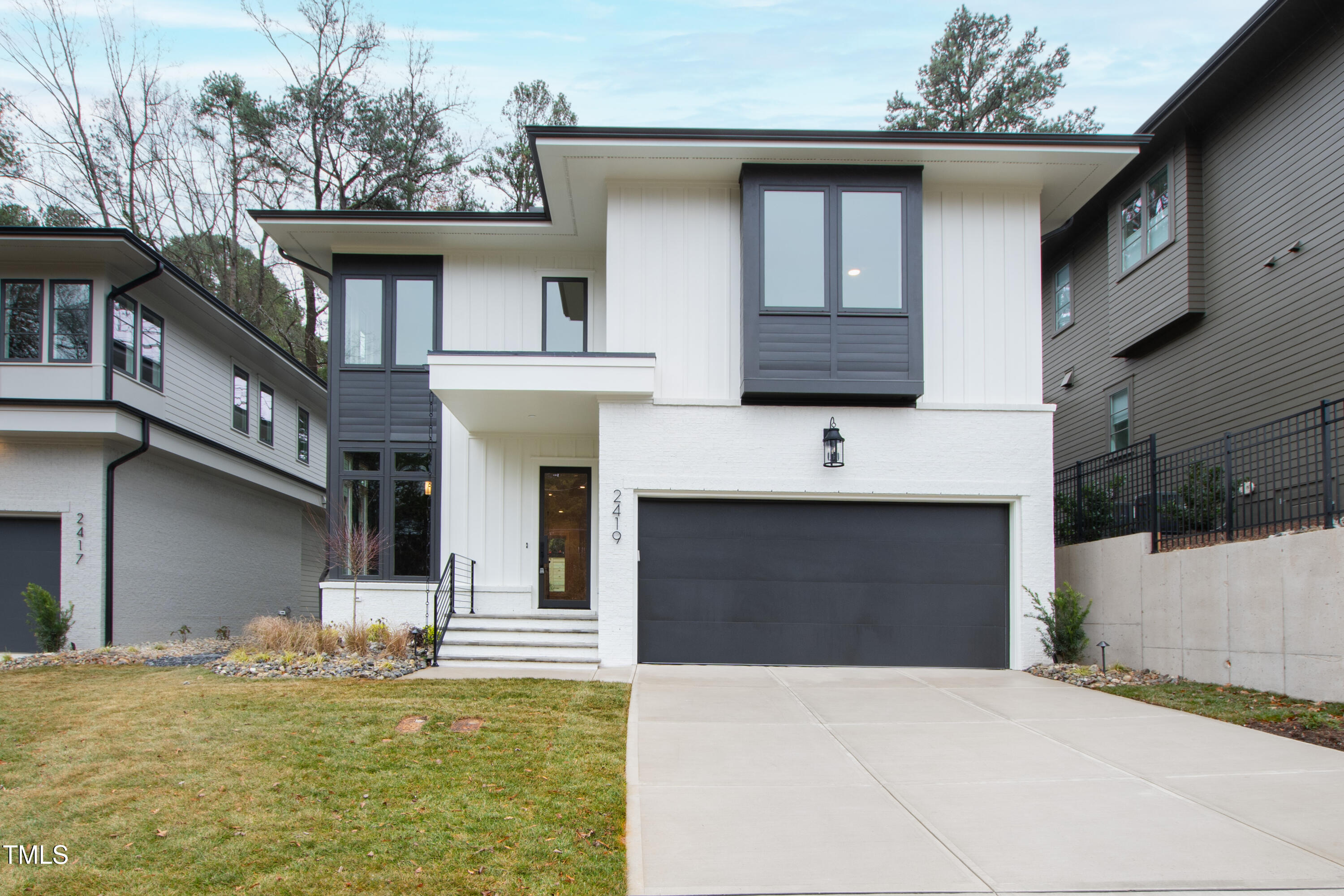 2419 Mayview Road Raleigh, NC 27607 - Photo 1 of 55 a front view of a house with a yard
