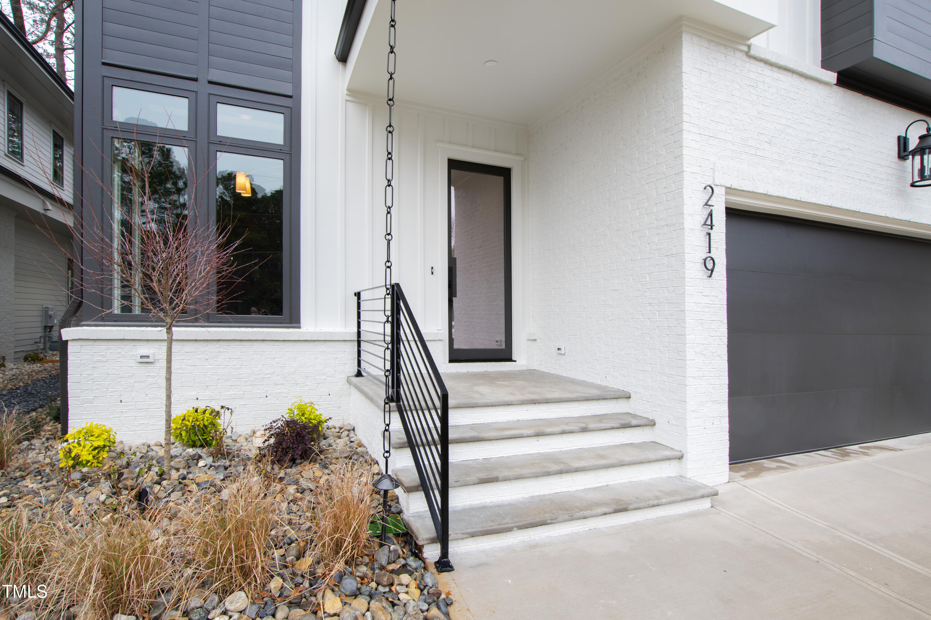 2419 Mayview Road Raleigh, NC 27607 - Photo 2 of 55 a view of a entryway of a house