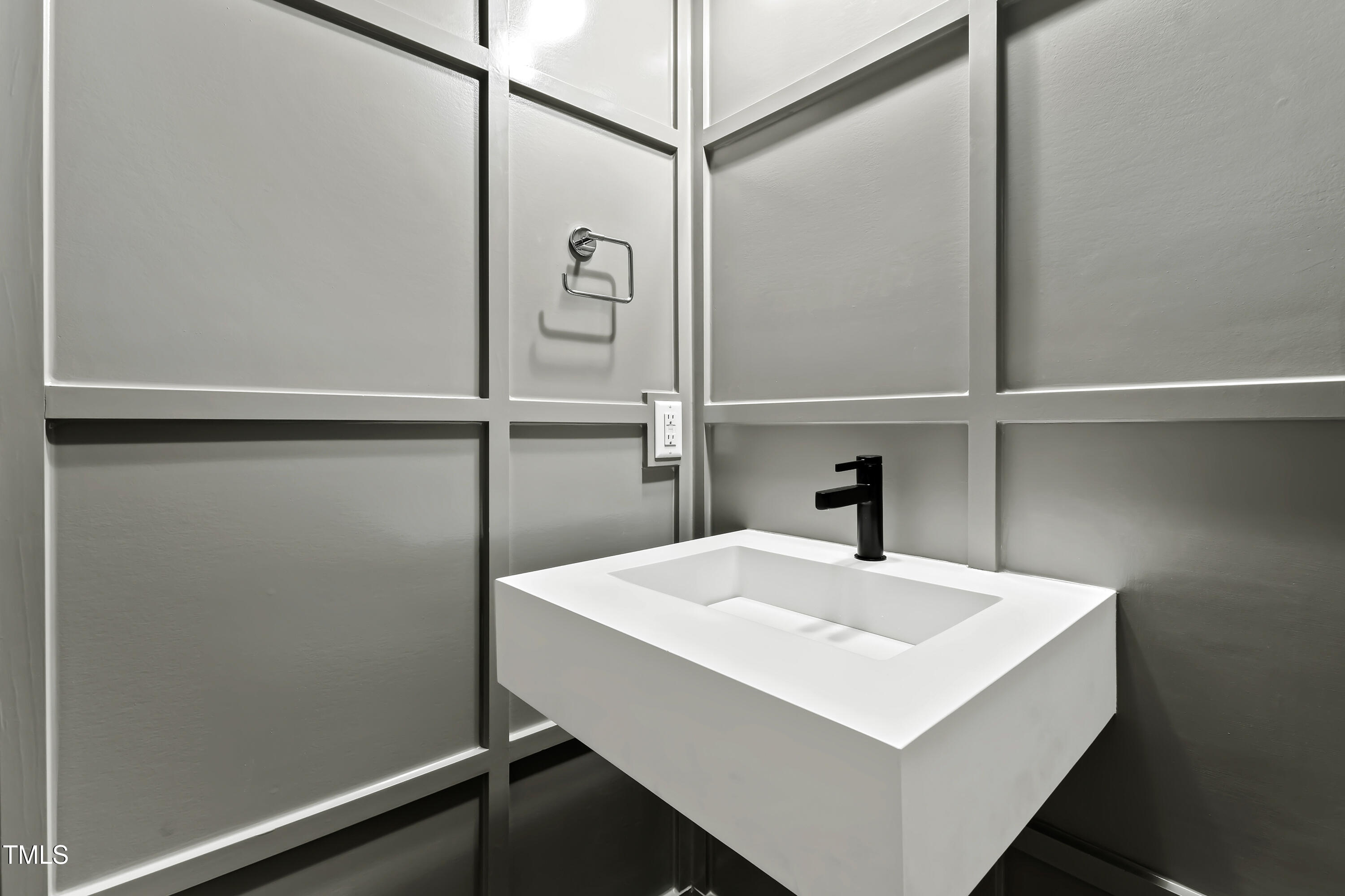 2419 Mayview Road Raleigh, NC 27607 - Photo 21 of 55 a white bathroom with a sink and mirror