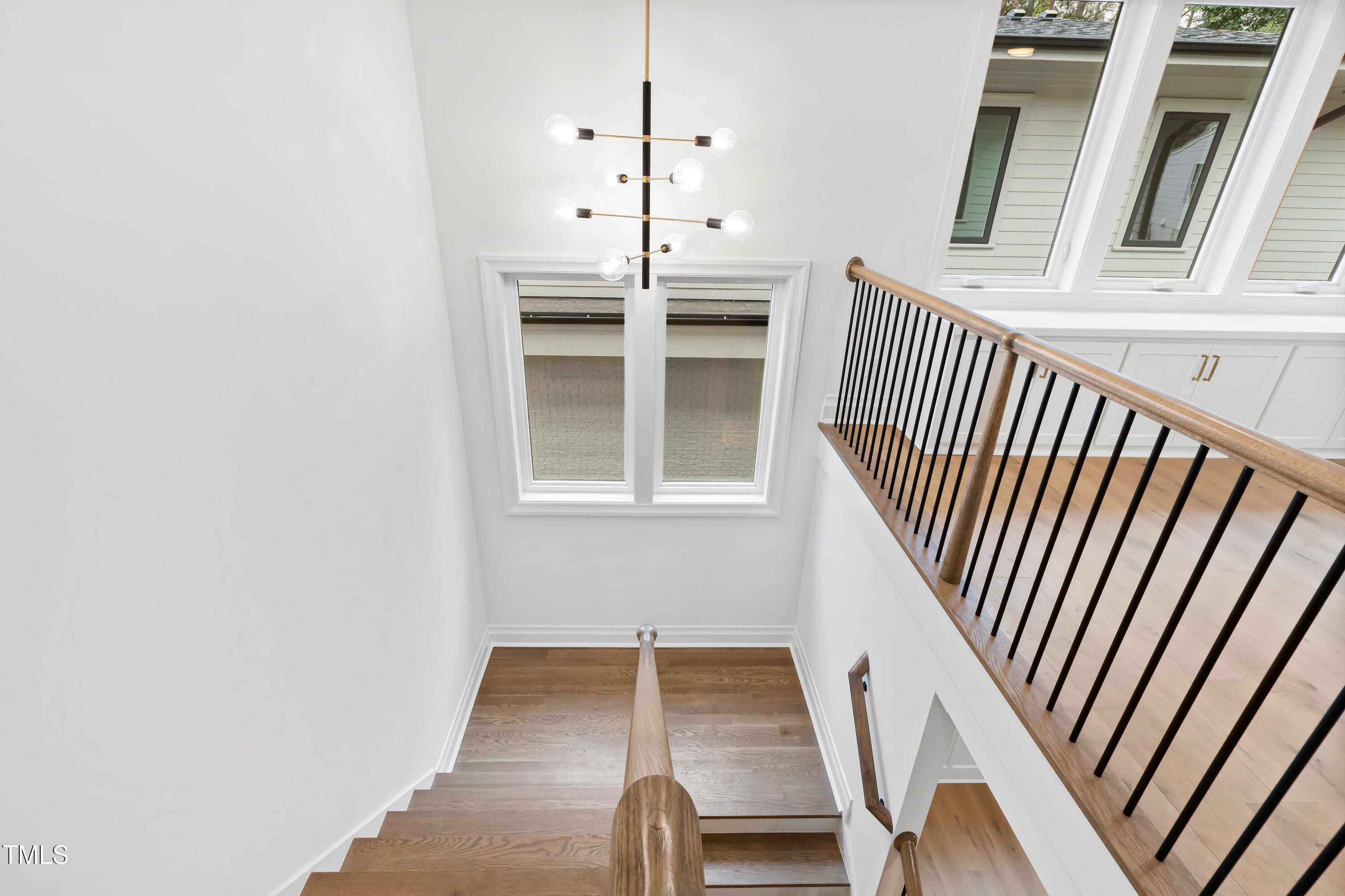 2419 Mayview Road Raleigh, NC 27607 - Photo 22 of 55 a view of a staircase and door