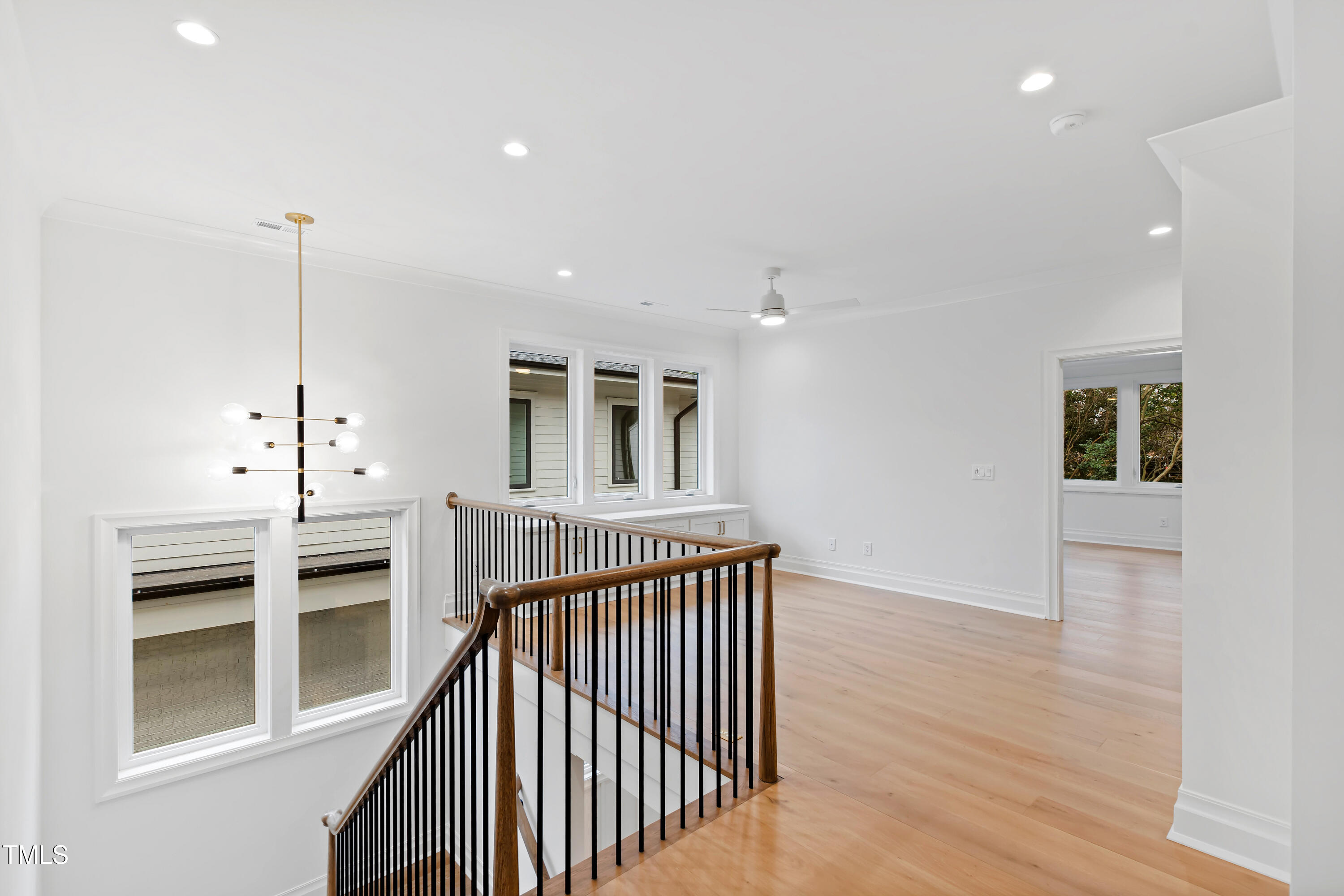 2419 Mayview Road Raleigh, NC 27607 - Photo 23 of 55 a view of a hallway with the staircase