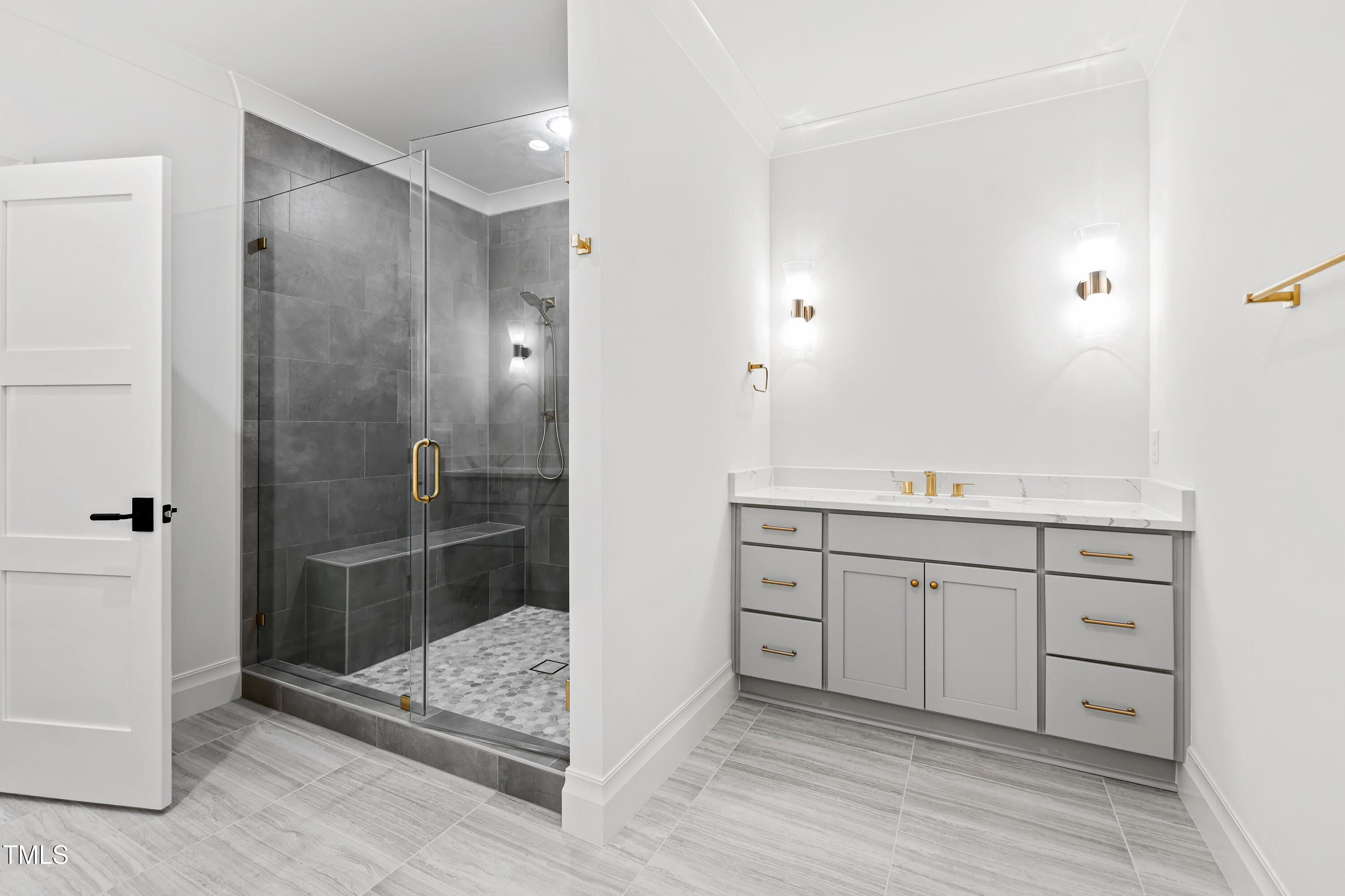 2419 Mayview Road Raleigh, NC 27607 - Photo 29 of 55 a bathroom with a shower sink and mirror