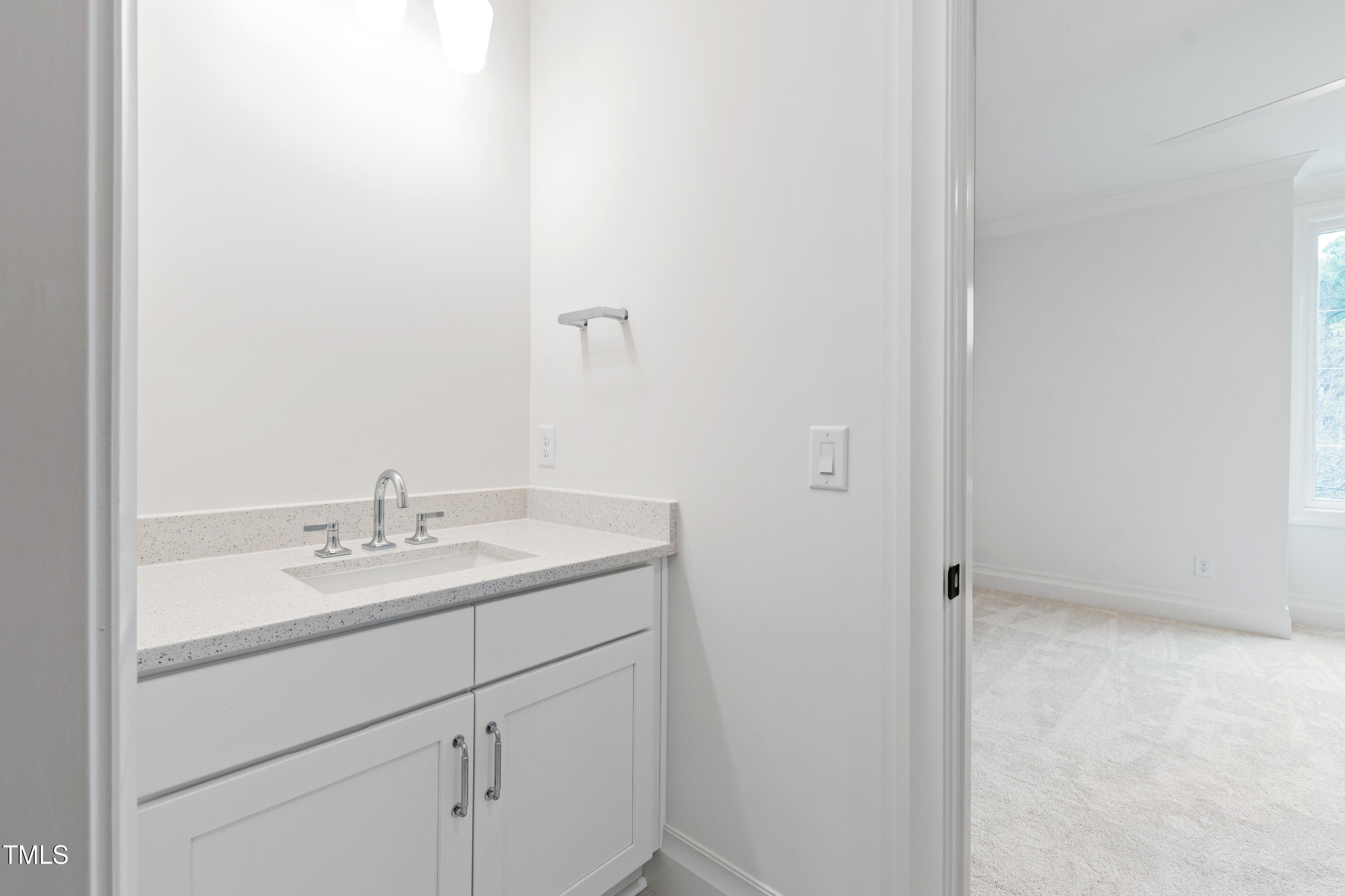 2419 Mayview Road Raleigh, NC 27607 - Photo 39 of 55 a bathroom with a sink and a mirror