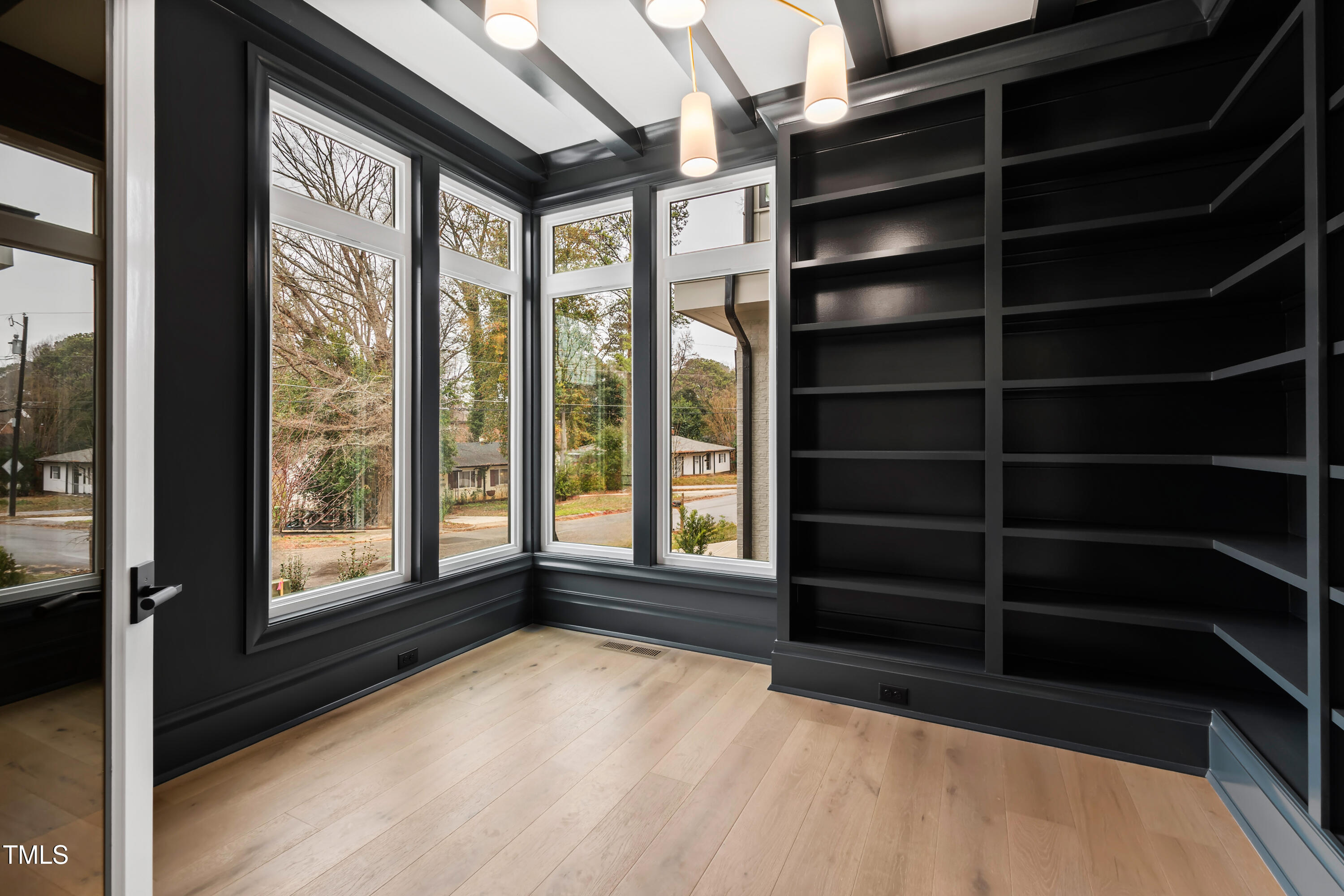 2419 Mayview Road Raleigh, NC 27607 - Photo 4 of 55 a view of an empty room with a window