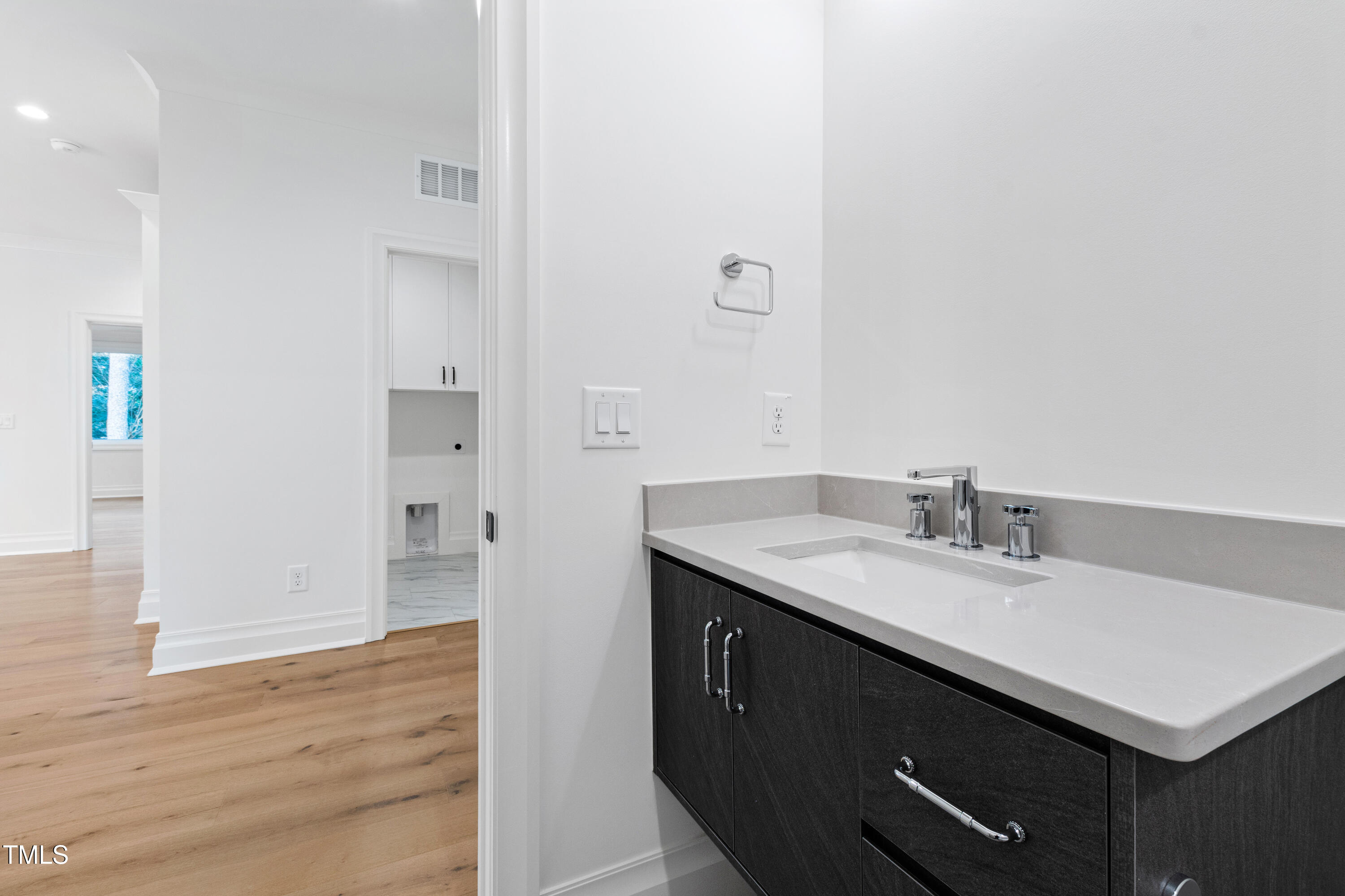 2419 Mayview Road Raleigh, NC 27607 - Photo 48 of 55 a bathroom with a sink and a mirror