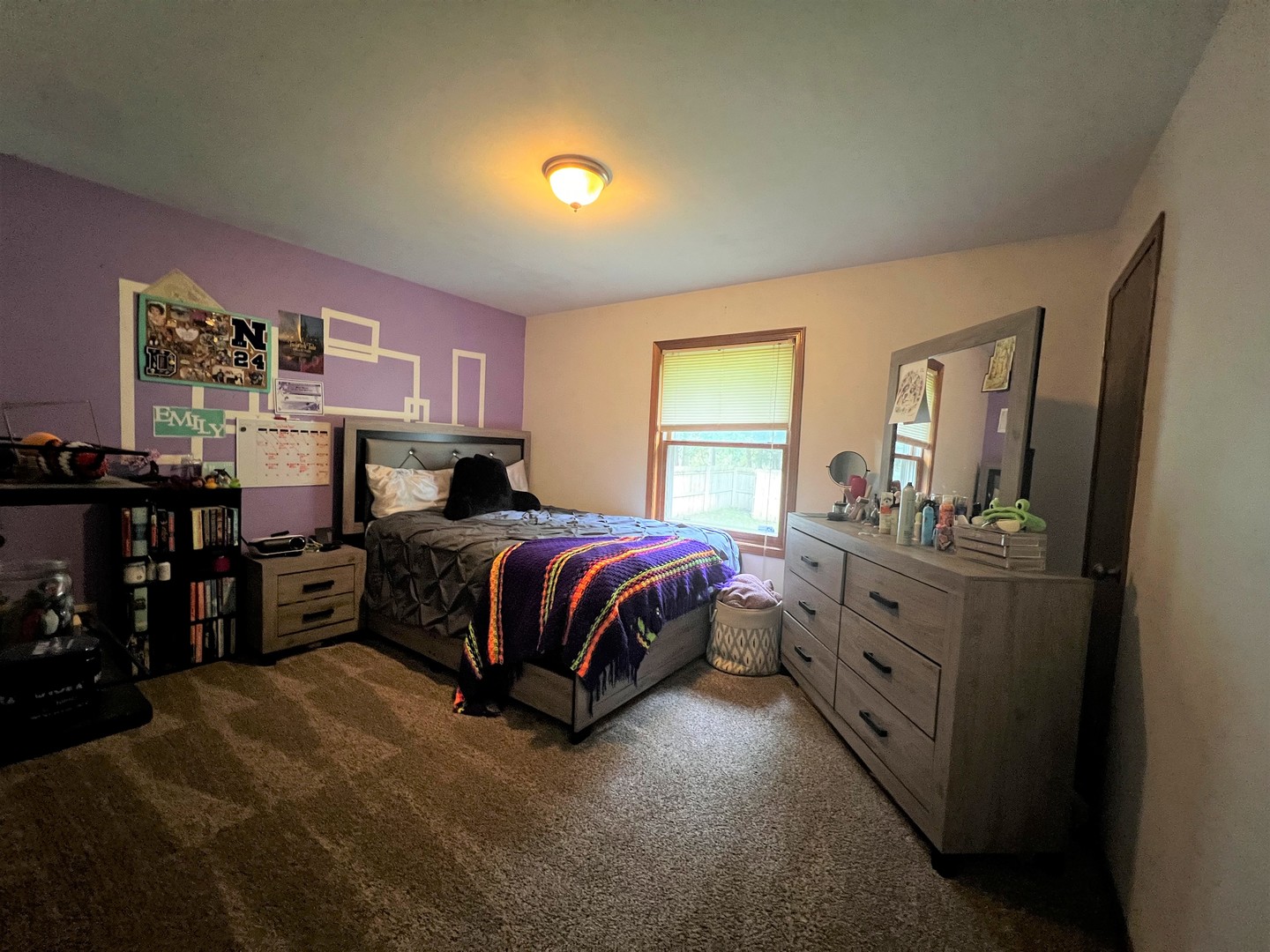 303 Minnesota Drive Dixon, IL 61021 - Photo 24 of 34 a bedroom with a bed and a mirror on dresser