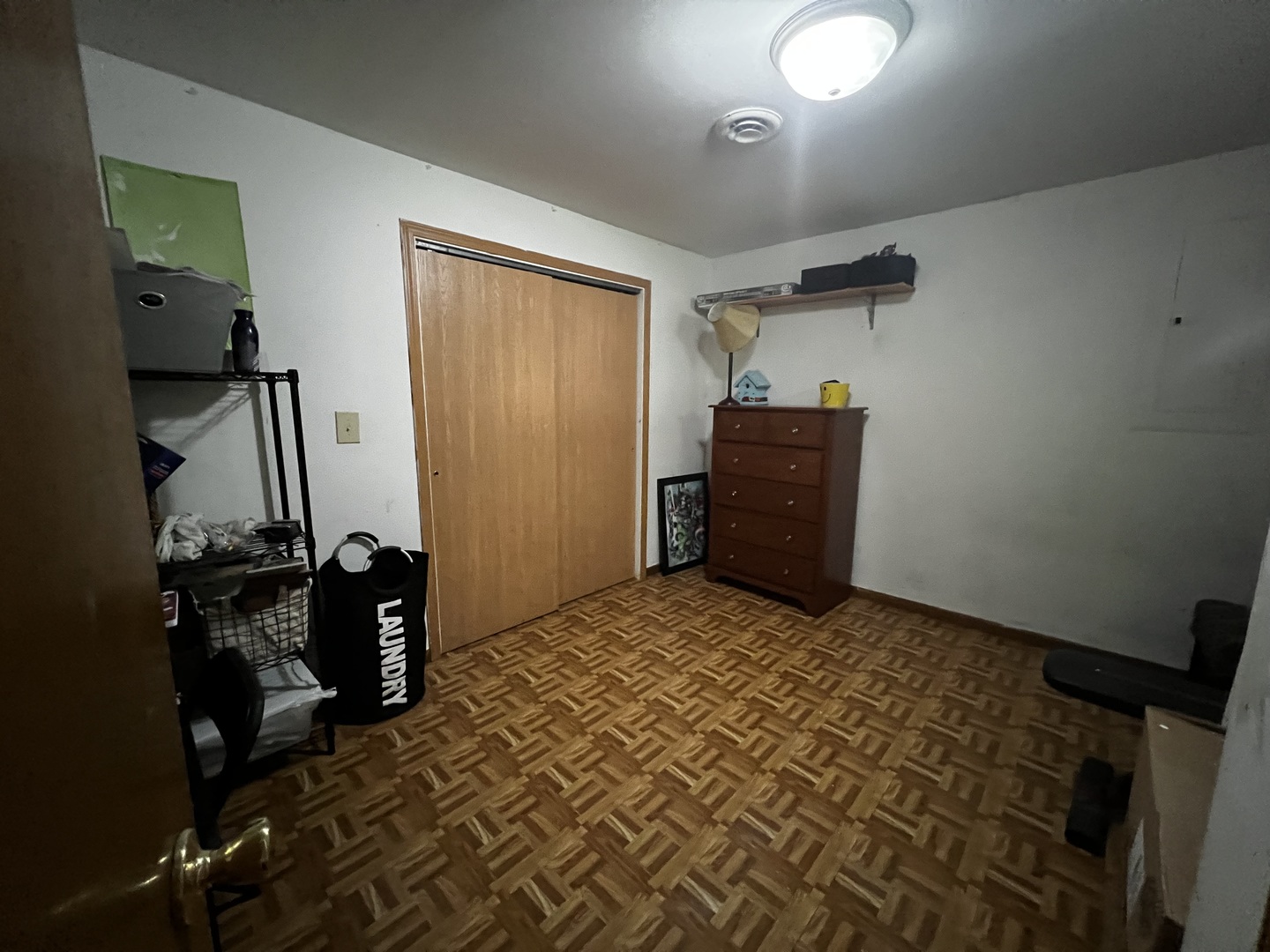 303 Minnesota Drive Dixon, IL 61021 - Photo 32 of 34 a bedroom with a bed and wooden floor