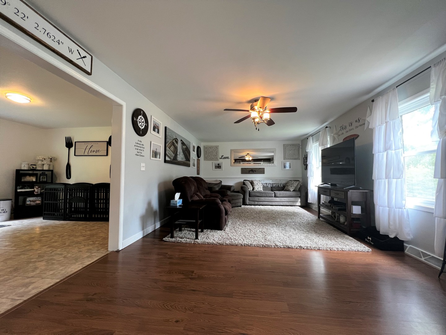 303 Minnesota Drive Dixon, IL 61021 - Photo 4 of 34 a living room with furniture and a flat screen tv