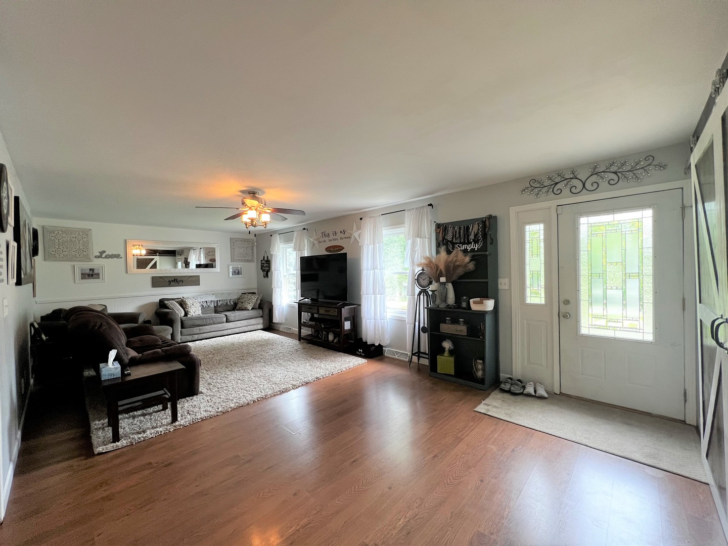 303 Minnesota Drive Dixon, IL 61021 - Photo 5 of 34 a living room with furniture and a fireplace