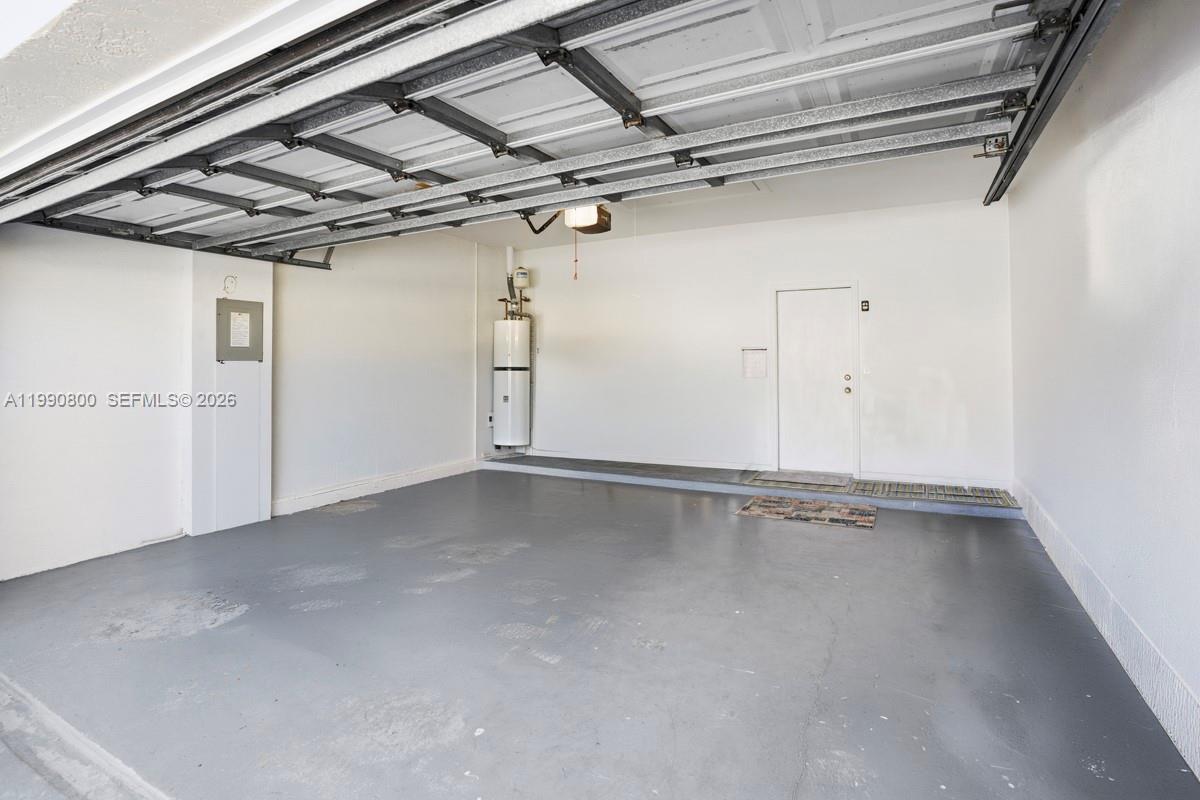 337 Southwest Maclay Way Port St. Lucie, FL 34986 - Photo 33 of 44 a view of a room with racks on the wall