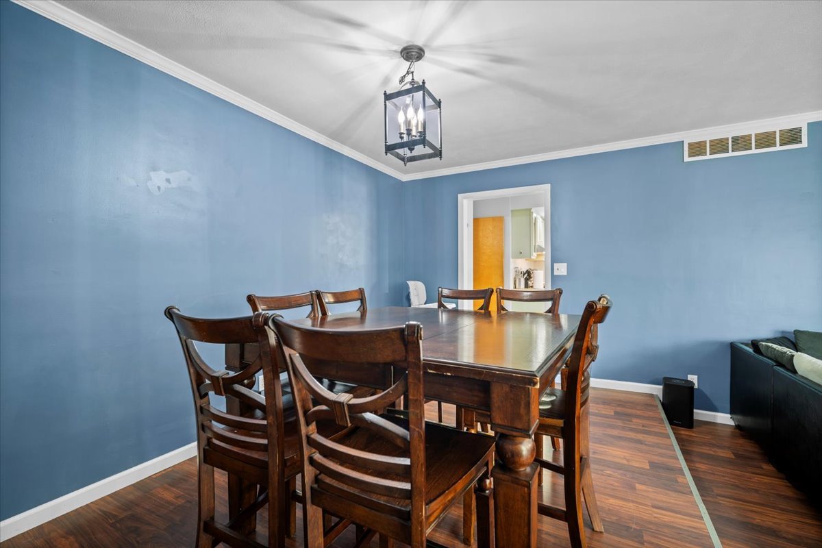306 North Coolidge Street Normal, IL 61761 - Photo 11 of 32 a view of a dining room with furniture window and wooden floor