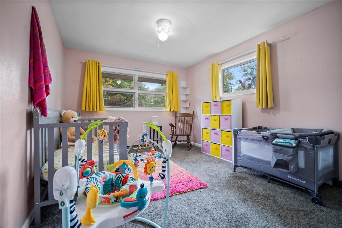 306 North Coolidge Street Normal, IL 61761 - Photo 16 of 32 a children room with toys and stairs