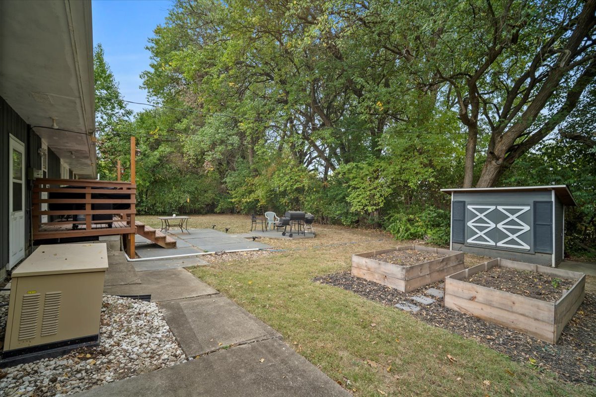 306 North Coolidge Street Normal, IL 61761 - Photo 27 of 32 a view of a backyard with sitting area