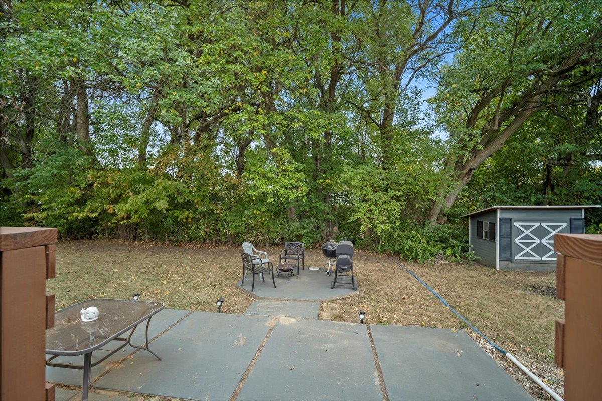 306 North Coolidge Street Normal, IL 61761 - Photo 29 of 32 a backyard of a house with table and chairs
