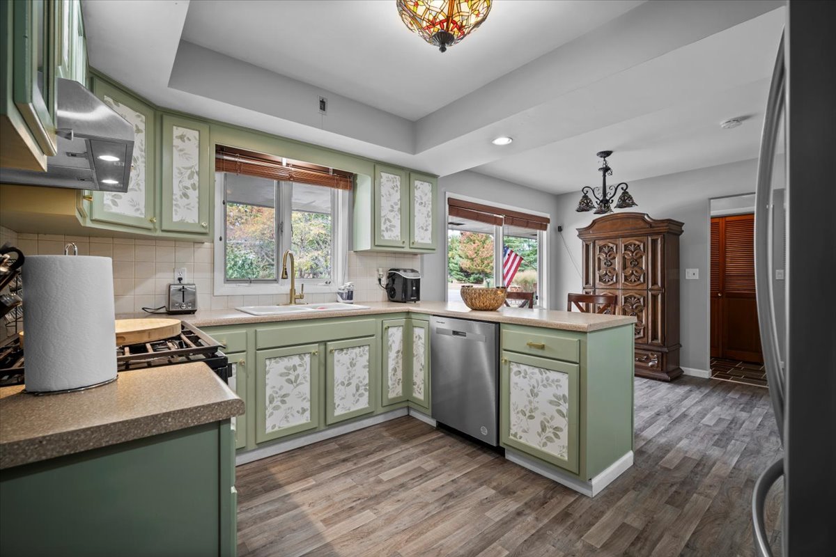 306 North Coolidge Street Normal, IL 61761 - Photo 3 of 32 a kitchen with sink stove and refrigerator