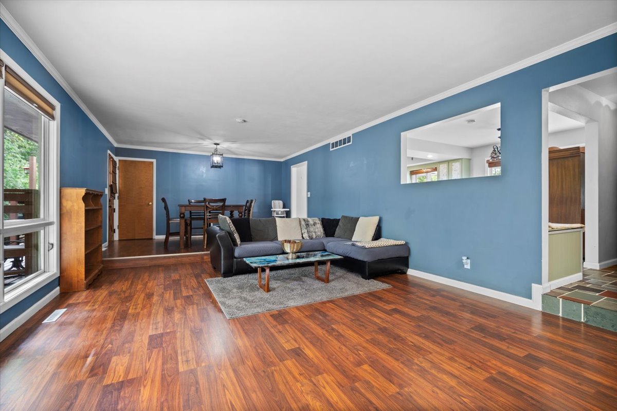 306 North Coolidge Street Normal, IL 61761 - Photo 7 of 32 a living room with furniture and a wooden floor