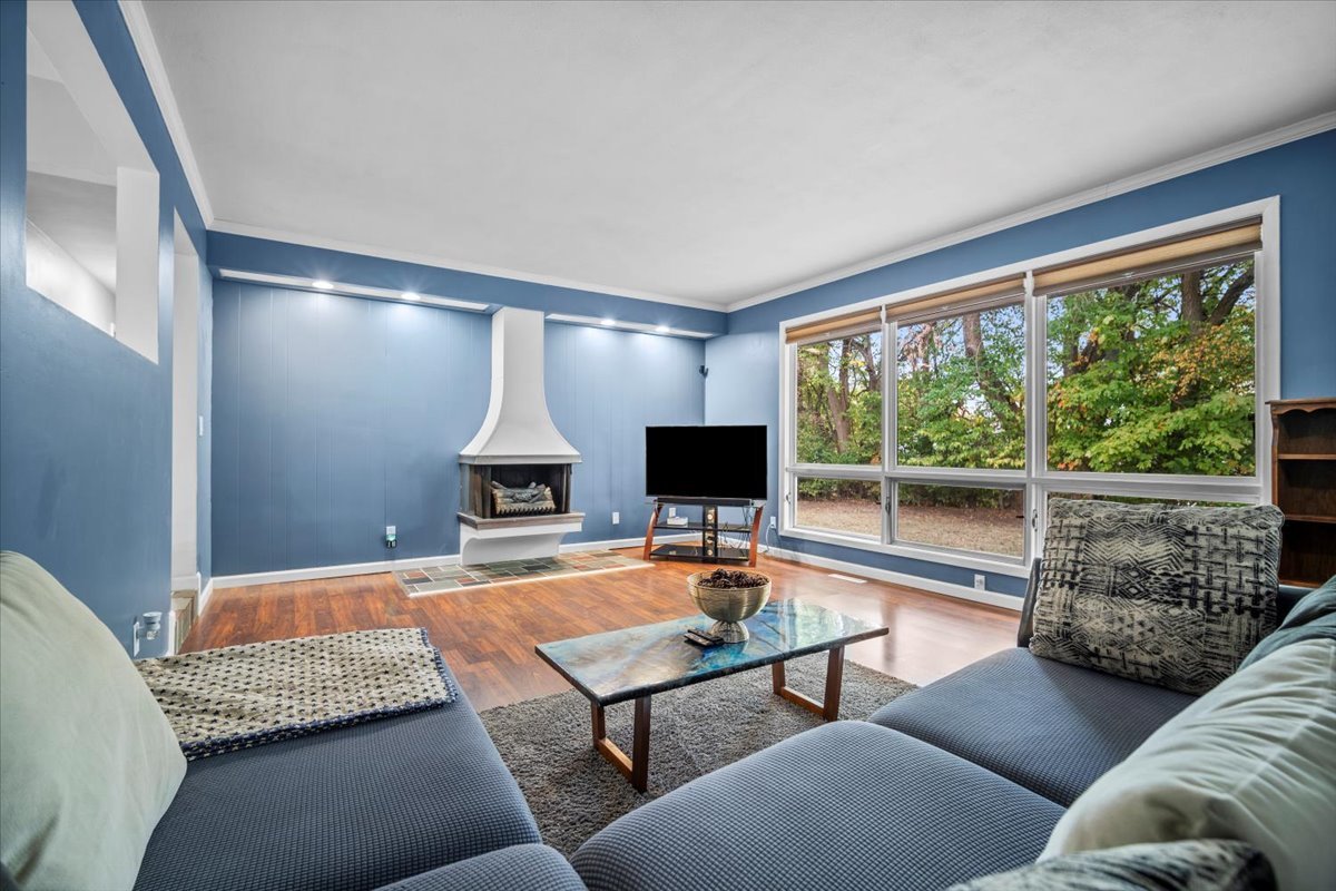 306 North Coolidge Street Normal, IL 61761 - Photo 8 of 32 a living room with furniture fireplace and a large window