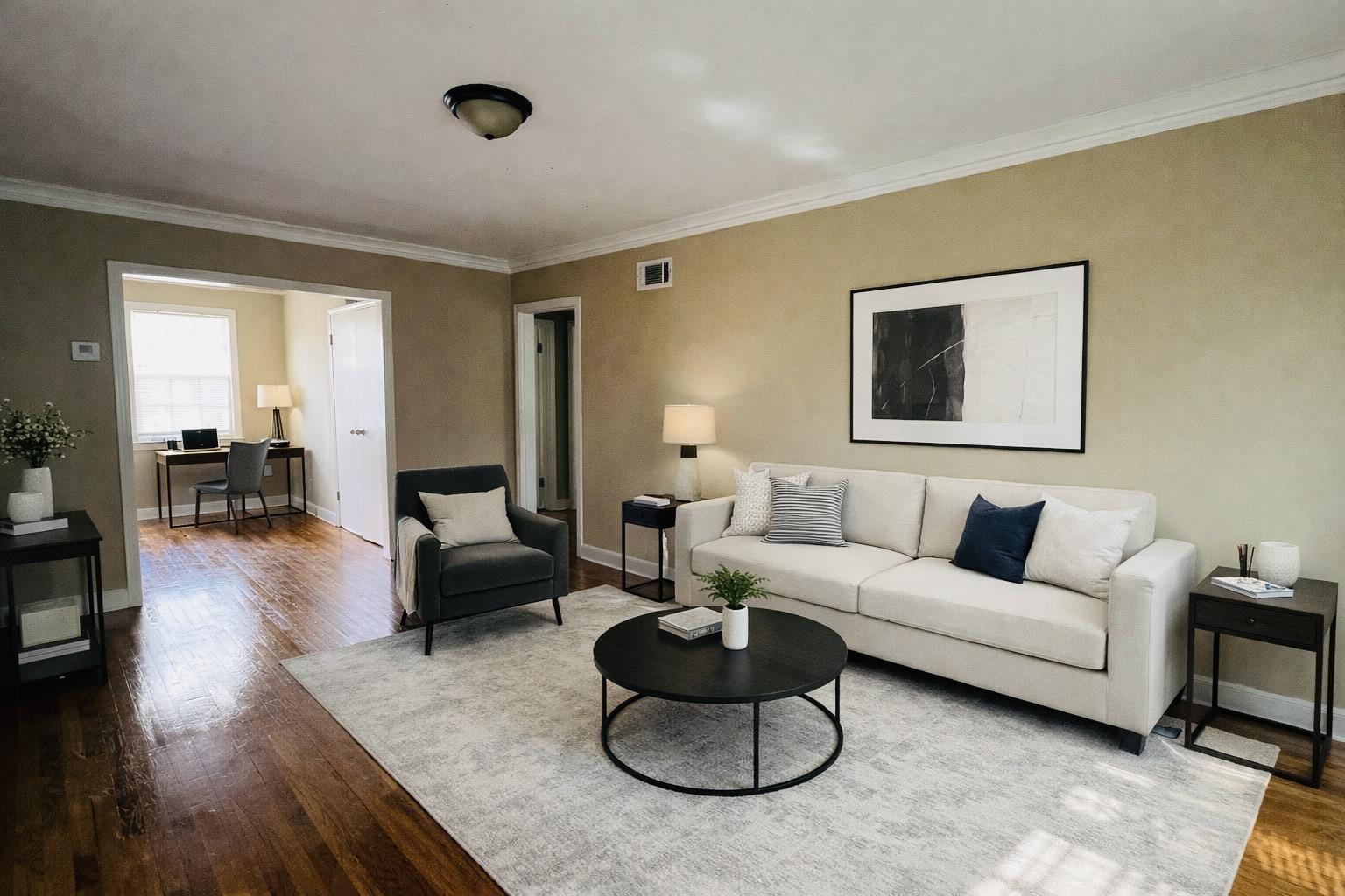 4868 Southern Avenue Memphis, TN 38117 - Photo 1 of 15 a living room with furniture or couch and a wooden floor