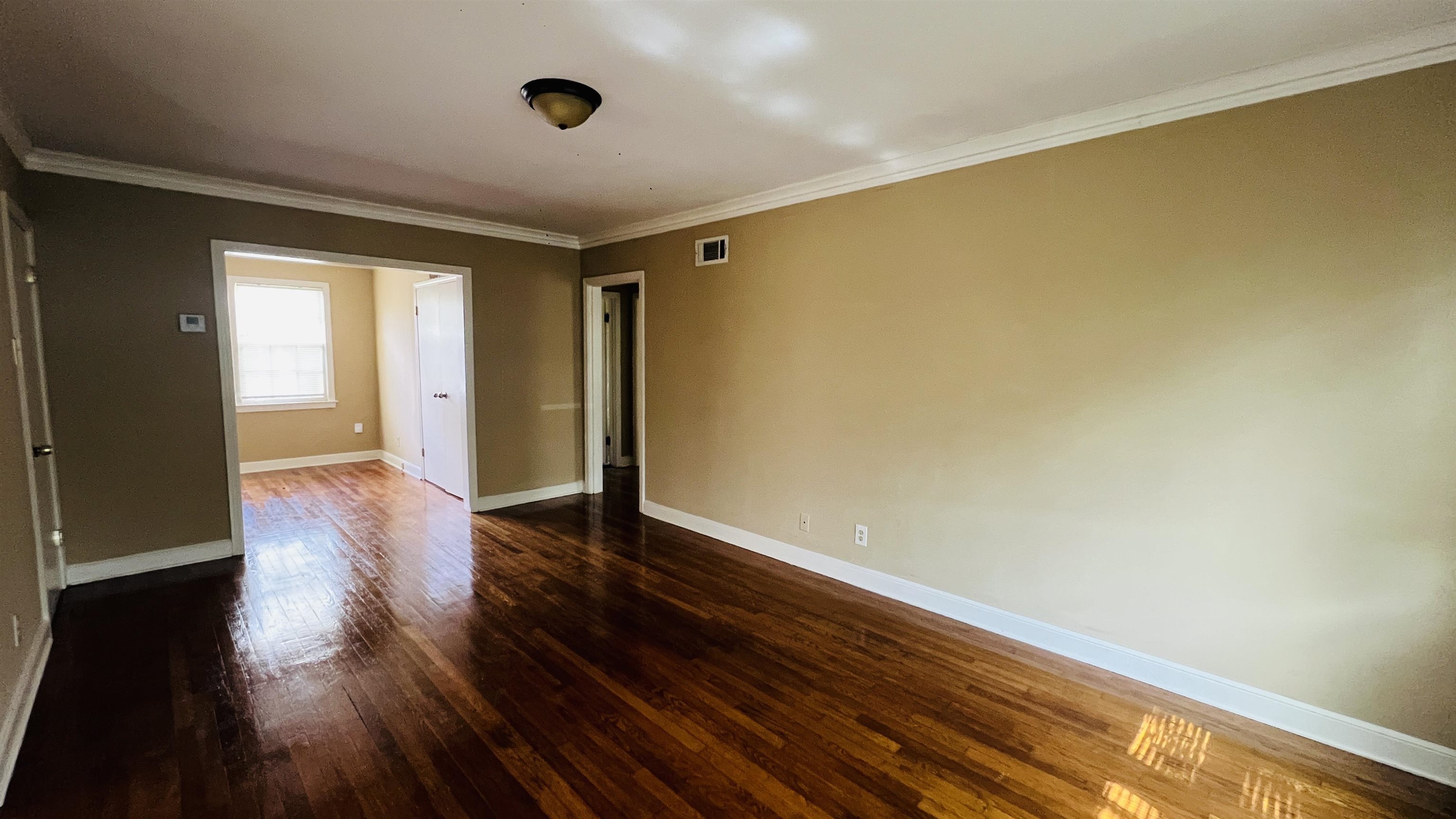 4868 Southern Avenue Memphis, TN 38117 - Photo 13 of 15 a view of hallway with wooden floor