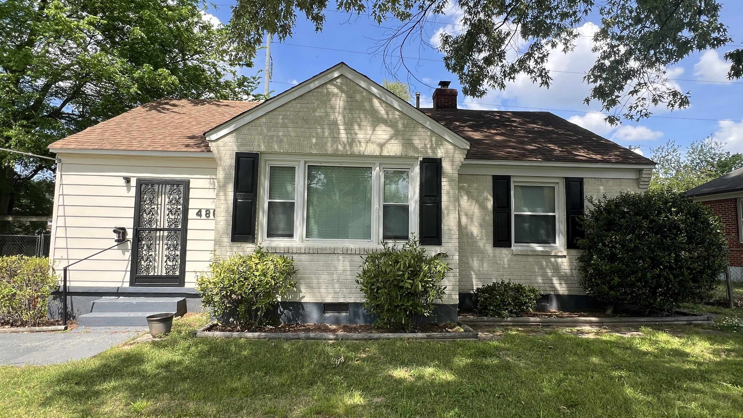 4868 Southern Avenue Memphis, TN 38117 - Photo 15 of 15 a front view of a house with a yard