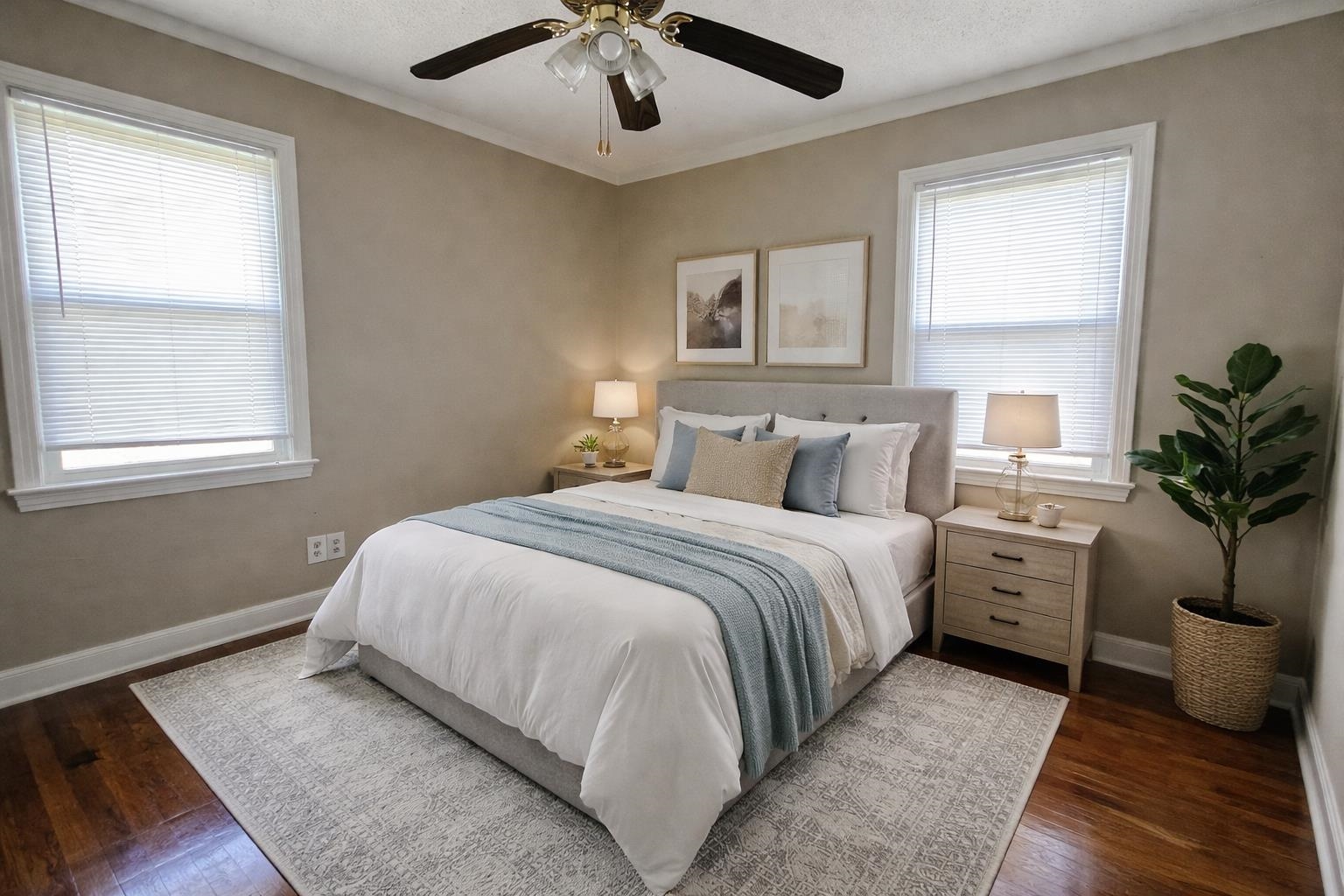 4868 Southern Avenue Memphis, TN 38117 - Photo 4 of 15 a bedroom with a large bed and a chandelier