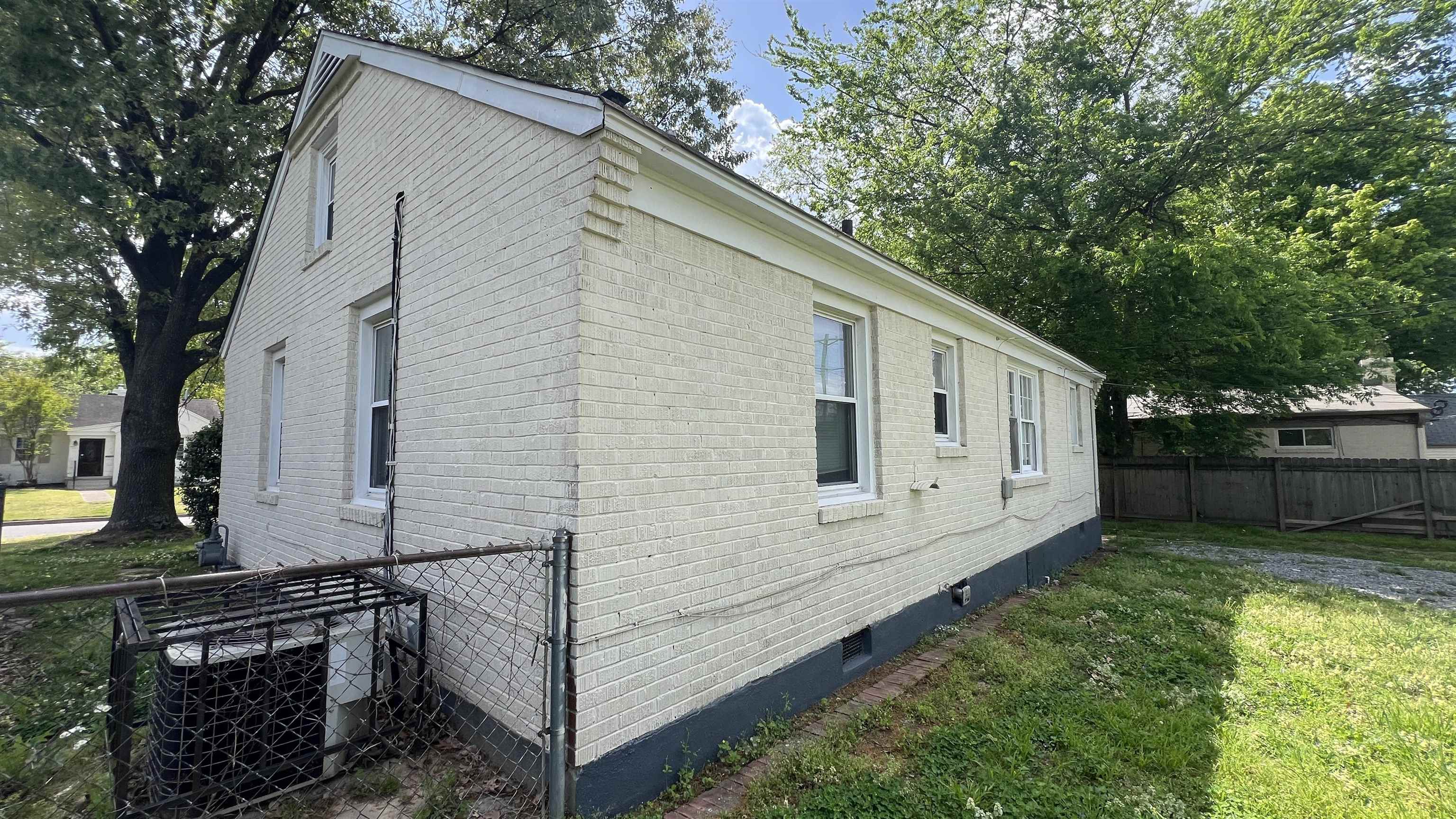 4868 Southern Avenue Memphis, TN 38117 - Photo 5 of 15 a view of a house with backyard and garden