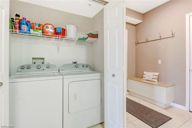 a storage room with washer and dryer