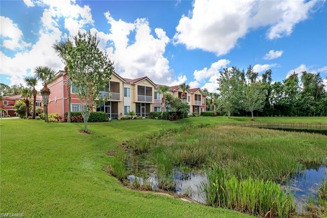 a view of a house with a big yard